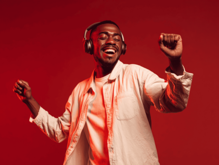 u2933761673_A_man_in_his_twenties_wearing_headphones_and_danc_1f7ea831-b508-432b-952d-49dca0406722_2.png